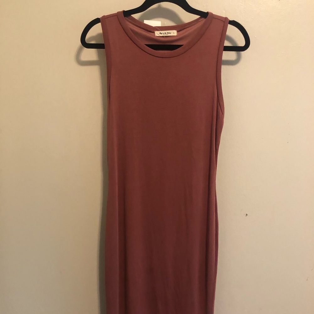Brand new! Very flattering to the body